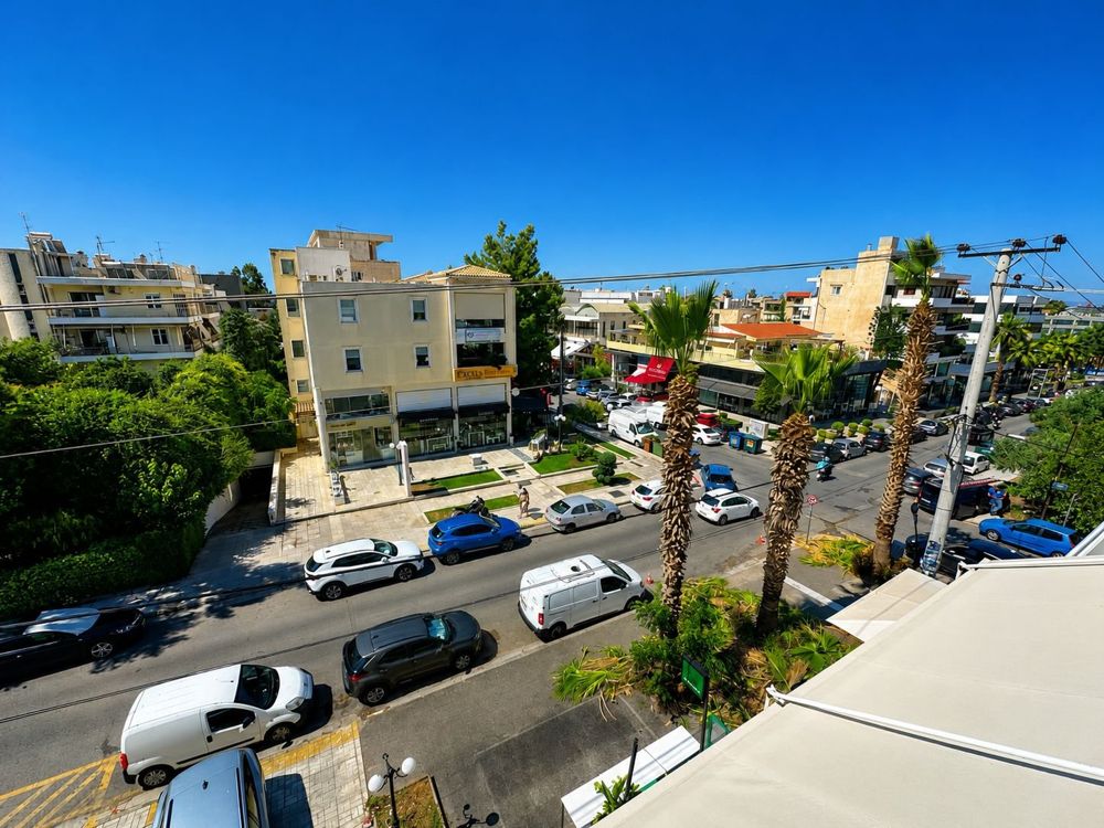 Palm-lined street in Glyfada Downtown